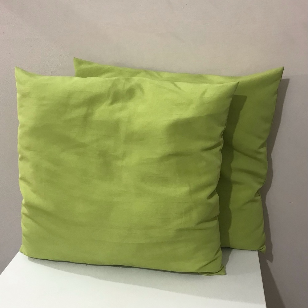 2 IKEA lime green throw pillows